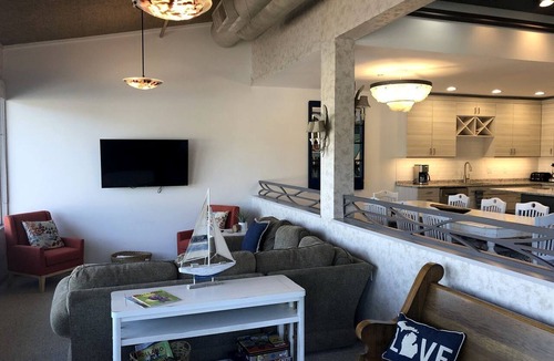 Macatawa House | Stylish Lakefront Loft with Marina Views at Eldean Shipyard near Macatawa, Michigan