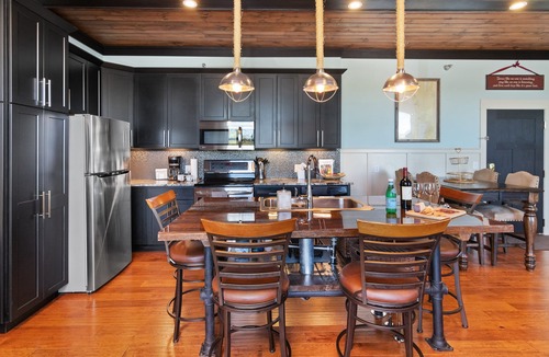 South Haven Condo | The Black Pearl: industrial condo sleeps 6, full size kitchen & scenic views!