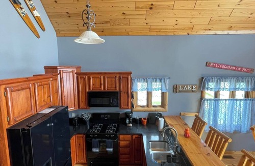 Cedar Lake House | "The Cedar Lake Escape" is a lakeside retreat offering 5 bedrooms and 3 baths.