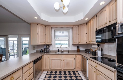 Paw Paw Lake House | The Colonial Estate on Paw Paw Lake with Pickle Ball & Sports Court