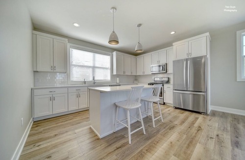 Douglas House | The views & location of this brand-new, luxury condo just can’t be beat! With a
