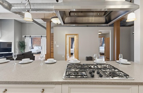 Wholesale District Condo | Top Floor Loft! 4 Bedrooms and 2,000 sq ft