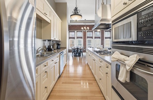 Wholesale District Condo | Top Floor Loft! 4 Bedrooms and 2,000 sq ft