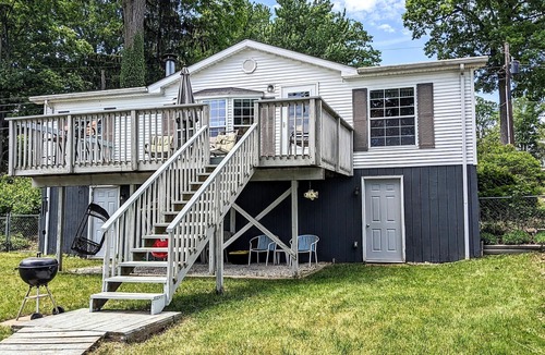 Coloma House | You'll love sipping a drink on the deck while enjoying views of Paw Paw Lake.