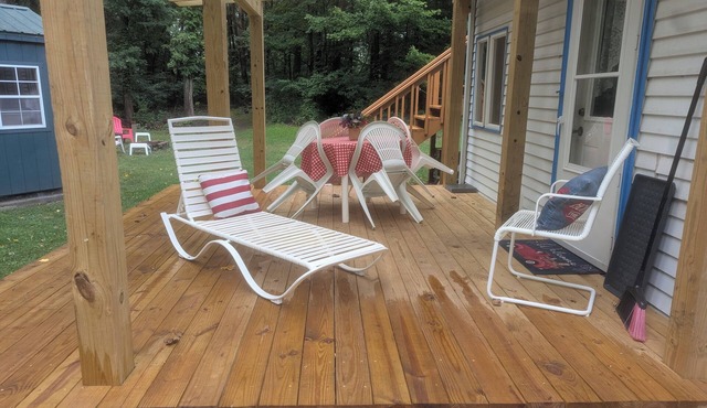 cottage surrounded by field and woods, walking distance to beach
