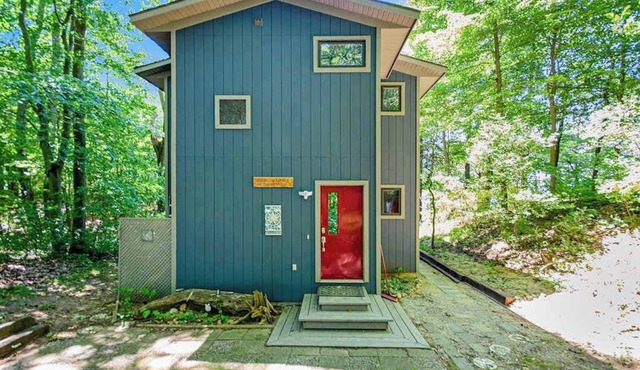 Dog-friendly home with lake views, wood stove, kayaks/SUPs, & W/D