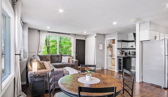 Enjoy elevated views from a quiet West Side hill! This home with a walk-out basement is a safe, peaceful oasis nestled at the end of a dead-end road, just minutes from the Medical Mile and downtown GR restaurants.