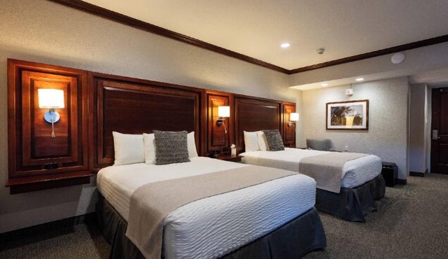 Executive Double Queen Room with Modern Amenities & Breakfast