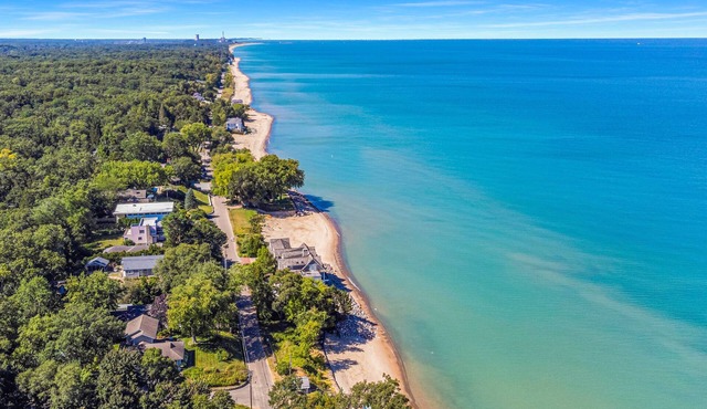 Lakefront getaway with lake views, private pool, game room & custom golf cart