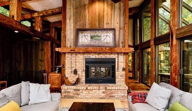 Relax in comfortable all seasons retreat nestled in forested dunes along Lk MI