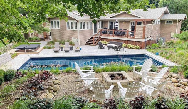 Relaxing home with private pool, hot tub, game room, & fireplace
