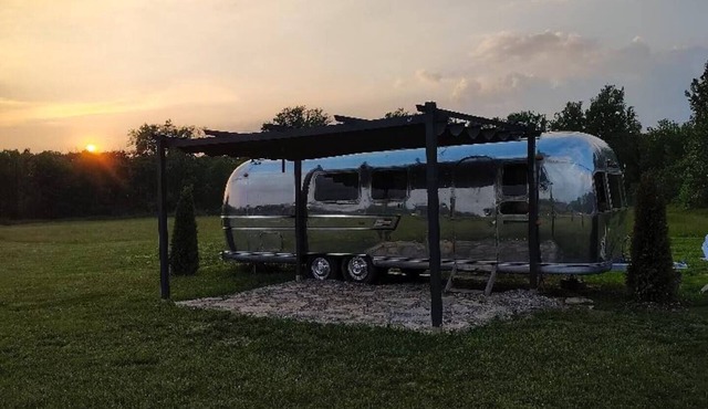 Renovated 1971 Airstream on an 80 acre animal rescue farm in Westville IN
