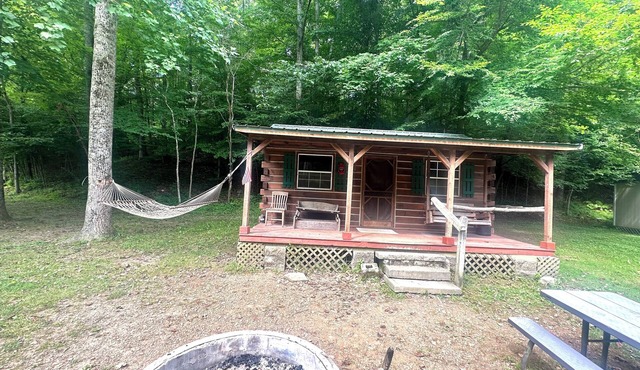 Rustic cabin in Nashville, Indiana offering a cozy camping experience