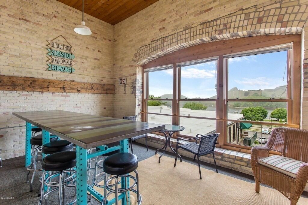 Grand Haven Condo | DOWNTOWN WATER VIEW PRIVATE BALCONY! 2 bedroom 1 bath w/large jacuzzi tub