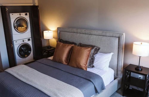Sheridan Apartment | Spacious, Private, & Modern Apartment with King Bed in middle of town.