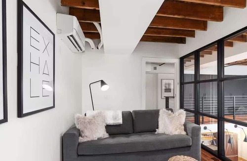 Grand Rapids Apartment | Drumlin Suite - Downtown Luxe Historic Roots & Private Parking