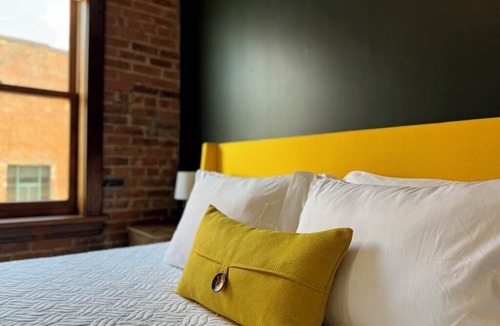 Central Business District Apartment | Downtown Luxury Loft, 13-Ft Ceilings, Walkable