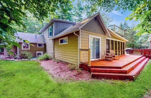 Fennville House | Lake Michigan Retreat with large patio, gas grill, fire pit, & outdoor hot tub