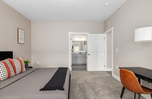 Grandville Apartment | Modern 4BR 4BA Two Unit Condo w Garage and Patio